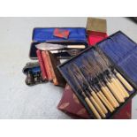 A mixed lot of items to include - Leather bound books - Binoculars - Silver plate flat ware