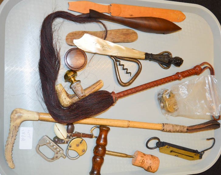 A group of collectables to include bottle openers, horse whips, scales, other items.