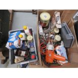 Two boxes of mixed electrics to include a power drill - light bulbs - drill bits etc