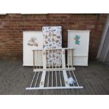 A child's wooden cot.