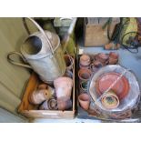 A watering can - Wine boxes and a quantity of plant pots