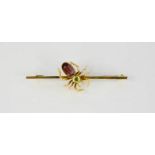 A 9ct gold spider bar brooch, the spider set with coloured faceted stones, 4g.