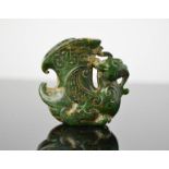 A Chinese natural jade handcarved small ceremonial dragon cup statue. 5cm by 5,5cm