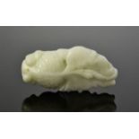 A Chinese natural white jade hand carved fish pendant. 5.5cm by 2.5cm