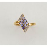 A 9ct gold, tanzanite and diamond cluster ring, size M, 2.14g.
