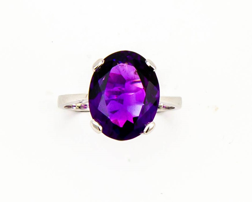 A 9ct white gold and amethyst cocktail ring, the amethyst approx 6ct and checkerboard cut, size O,