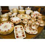 A Royal Albert 'Lady Hamilton' pattern bone china dinner and tea service: dinner plates, oval
