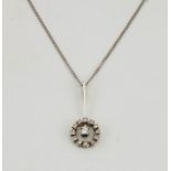 An 18ct white gold and diamond pendant necklace, in the French Art Deco style, with 9ct white gold