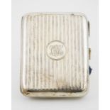 A silver cigarette case, gilded interior, engraved with monogram CHH, Birmingham 1919, 2.56toz.