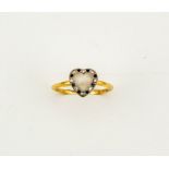 An 18ct gold heart shaped moonstone, diamond and sapphire, size M½, 2.3g.