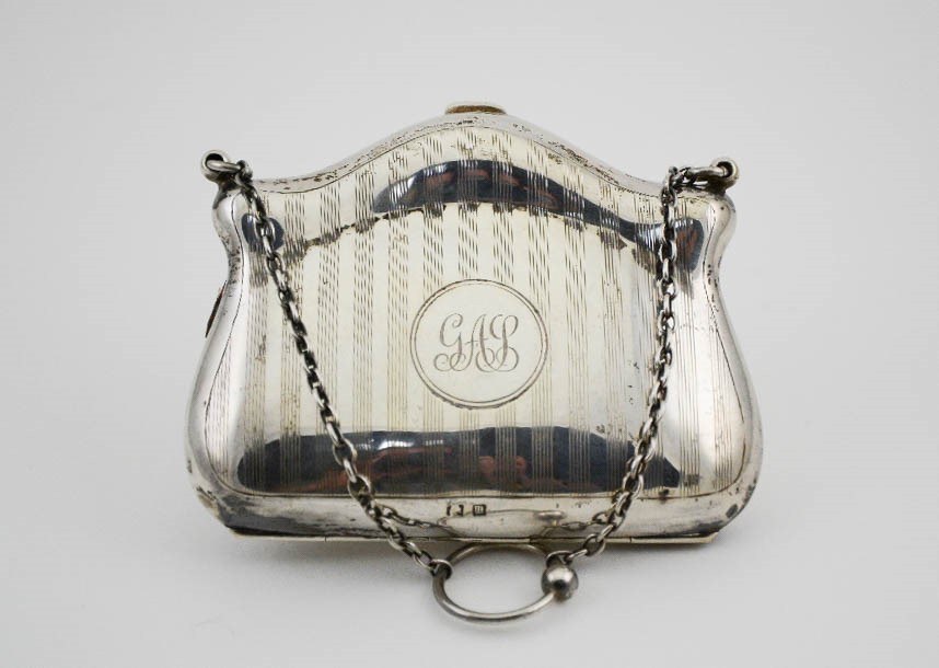 A silver purse, with machine engraved decoration and monogram to the centre, Birmingham 1911, - Image 2 of 2