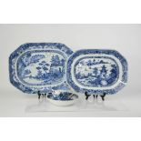 Two 19th century blue and white stoneware glazed platters, depicting landscapes, 28 by 22cm, and