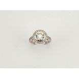 An 18ct white gold diamond ring, the central diamonds 2.01ct, HS12, diamonds to the shoulders and