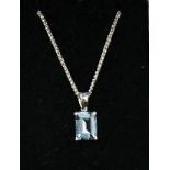 An 18ct white gold aquamarine pendant necklace, the aquamarine approx 1ct, with 9ct white gold