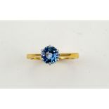 An 18ct yellow gold and sapphire solitaire ring, the brilliant cut sapphire approx 1.70cts, size