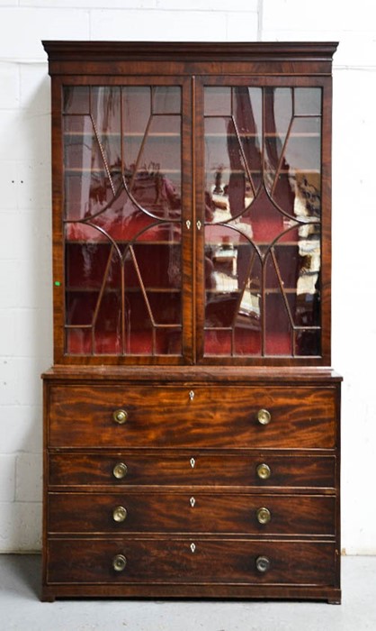 A Georgian mahogany secretaire bookcase, with two upper astrigal glazed doors enclosing height