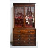 A Georgian mahogany secretaire bookcase, with two upper astrigal glazed doors enclosing height