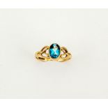 A 9ct gold and blue topaz ring, size O, 2.3g.