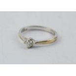 An 18ct white gold and diamond solitaire ring.