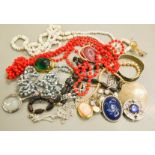 A group of costume jewellery, to include brooches silver and pearl bracelet, a simulated pearl