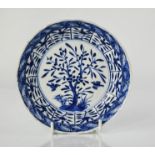 An early 19th century blue and white Japanese dish, with signature to the base, depicting birds