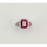 An 18ct white gold Art Deco style ruby and diamond ring, size N, 4.8g.