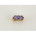 A 14ct gold, tanzanite and diamond ring, size L, 3.5g.