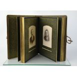 A Victorian album of photograph portraits.