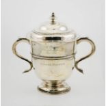 An early 18th century silver trophy, London 1709, engraved to the front:George Hibbitt, Mr Barkers