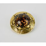 A vintage Scottish gilt brooch signed Miracle, with inset tortoiseshell glass