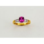 An 18ct yellow gold, pink sapphire and diamond ring, the cushion cut sapphire 1.58ct, the flanking