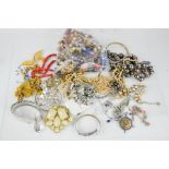 A quantity of costume jewellery, to include necklaces, bangles, simulated pearl necklace, paste