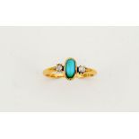 An Edwardian 18ct gold (worn hallmarks) diamond and oval turquoise ring, size P, 2.6g.