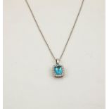 An 18ct white gold, aquamarine and diamond pendant, the radiant cut 0.80ct aquamarine bordered by