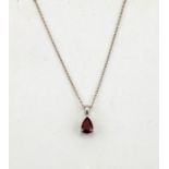 An 18ct white gold and ruby pendant, the pear cut ruby approximately 1.04ct, 2.5g.