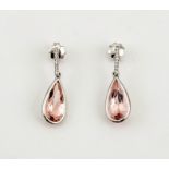 A pair of 18ct white gold, morganite and diamond earrings, the pear cut morganites total 7ct, the