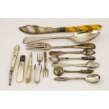 Three silver niello work spoons, a silver spoon and fork, Chester 1923, 2.77toz total.