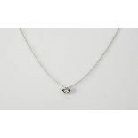 An 18ct white gold and rub over setting, slider pendant on chain, the diamond approx 0.5ct, 2g.