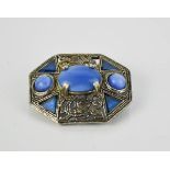 A vintage Scottish blue agate brooch signed Miracle