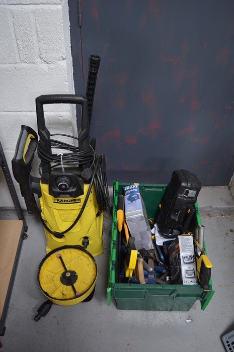 A quantity of hand tools and a Karcher pressure washer