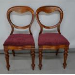 Two Victorian balloon back chairs.