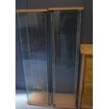 Two Ikea glass display cabinets.