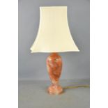 A marble table lamp.