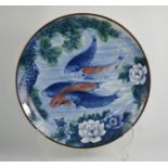 A Japanese charger, depicting coy carp and lotus flowers, 36cm diameter.