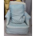 An Edwardian blue upholstered armchair.