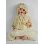 An early 20th century German bisque head doll, possibly by Kestner numbered 41 to the back of the