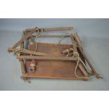 A vintage wooden childs swing