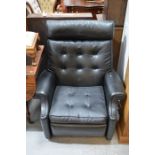 A Parker Knoll black reclining armchair