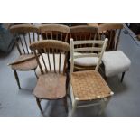 A set of five pine kitchen chairs and one rush seated chair.