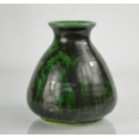 A Ruskin vase with green mottled glaze, stamped underside, 12cm high.